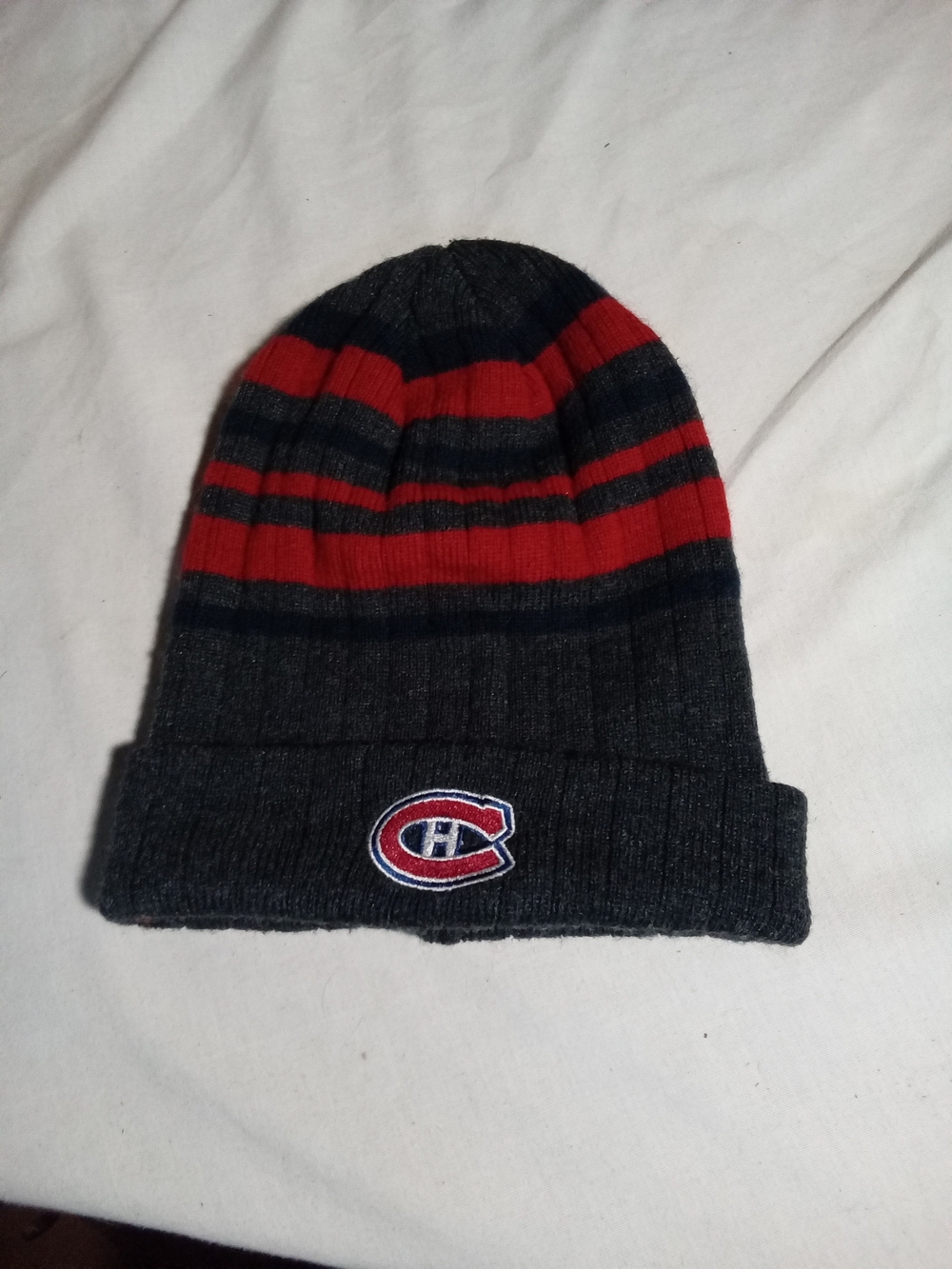 NHL Striped Knit Beanie in Red & Black